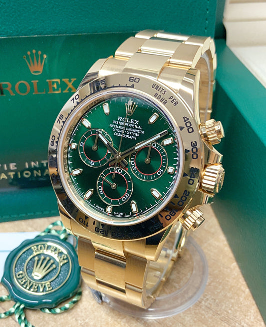 The Rolex Daytona Reference 116508 in gold with a green dial