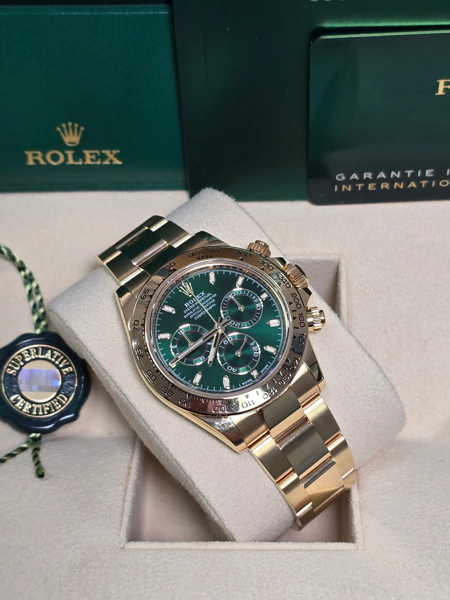 The Rolex Daytona Reference 116508 in gold with a green dial