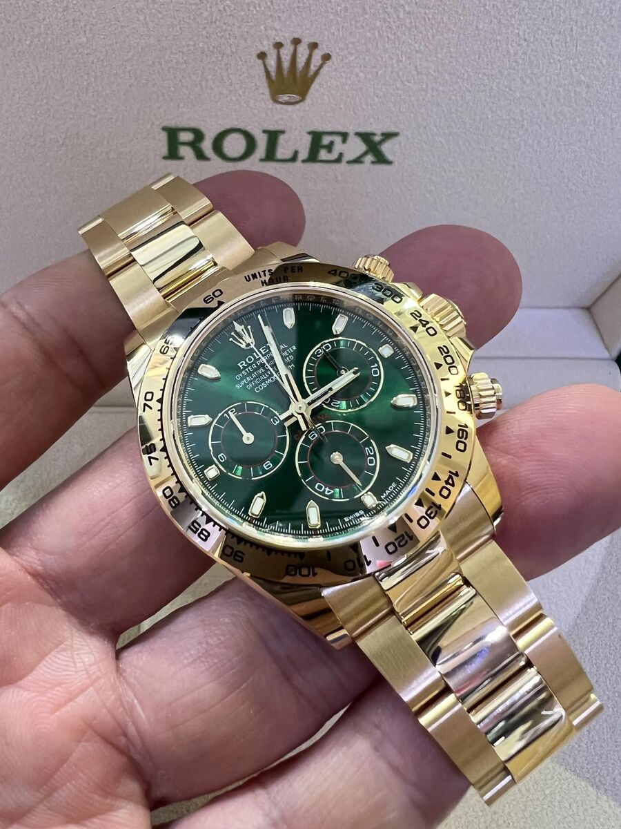 The Rolex Daytona Reference 116508 in gold with a green dial