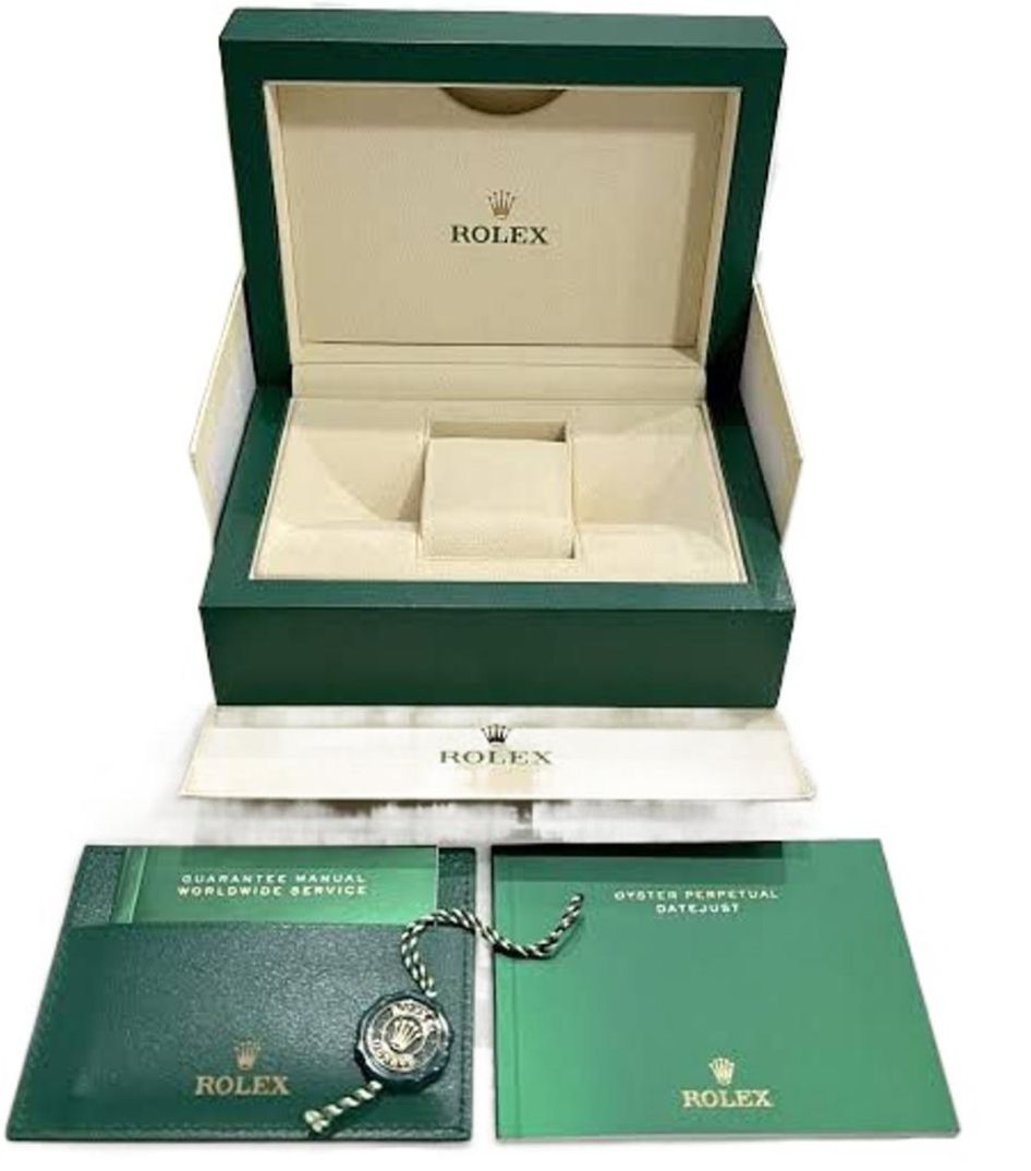 The Rolex Daytona Reference 116508 in gold with a green dial